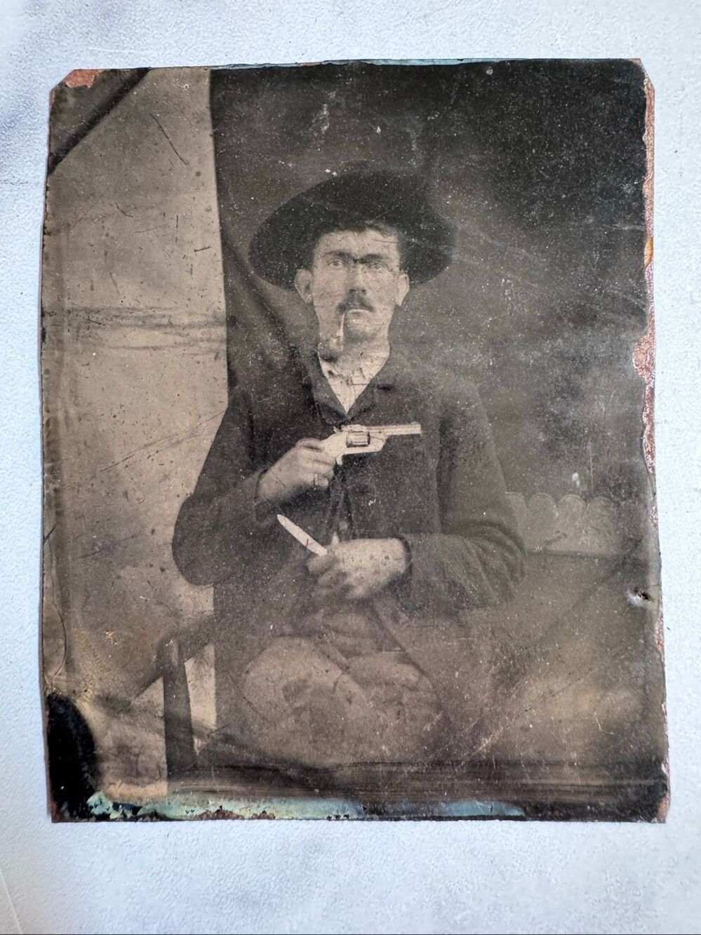 Antique metal tin photograph single man pistol cowboy black white Ferrotype tint
